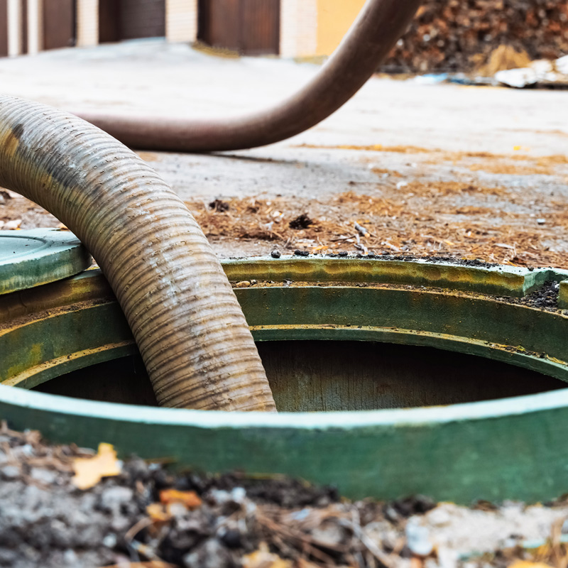 sewer tank being cleaned out